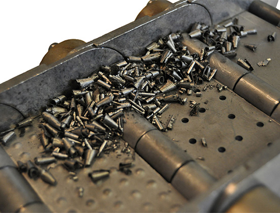 small chips on a hinged steel belt conveyor